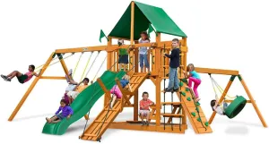 Gorilla Playsets 01-0004-AP-1 Frontier Wood Swing Set with Green Vinyl Canopy, Tire Swing, Two Belt Swings, Picnic Table, Sandbox, Rock Climbing Wall, Amber