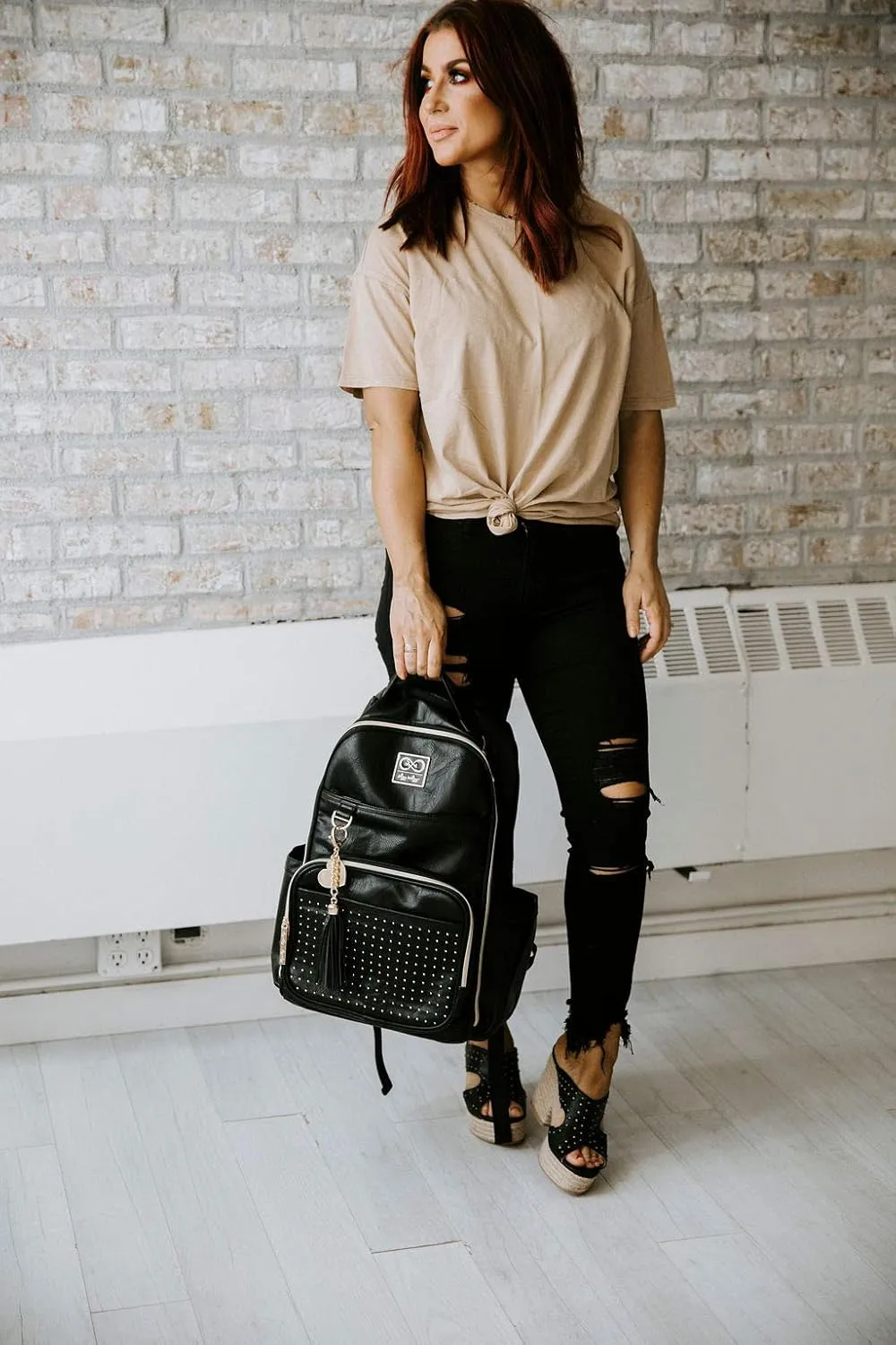 Itzy Ritzy Chelsea   Cole Diaper Bag Backpack - Studded Boss Backpack Diaper Bag Includes 19 Pockets, Changing Pad, Stroller Clips & Tassel; Black with Sweetheart Print Interior & Gold Hardware