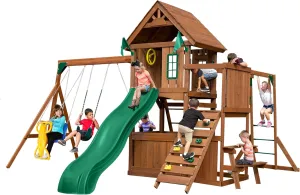 Swing-N-Slide Caribou Valley Wooden Swing Set with Wood Roof, Wave Slide, Monkey Bars, Climbing Wall, Ladder, Picnic Table, and Swings, Green Slide